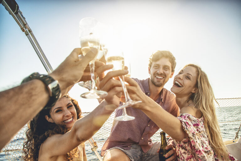 Toasting to summer: sailboat cruise with friends